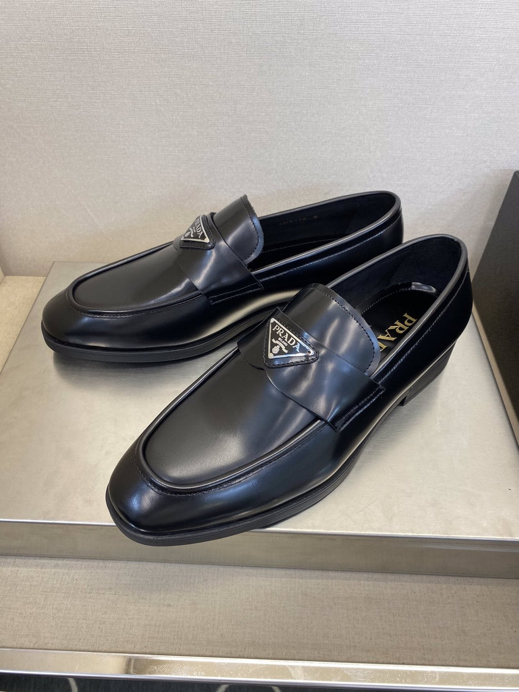 Prada Black Triangle Plaque Loafers